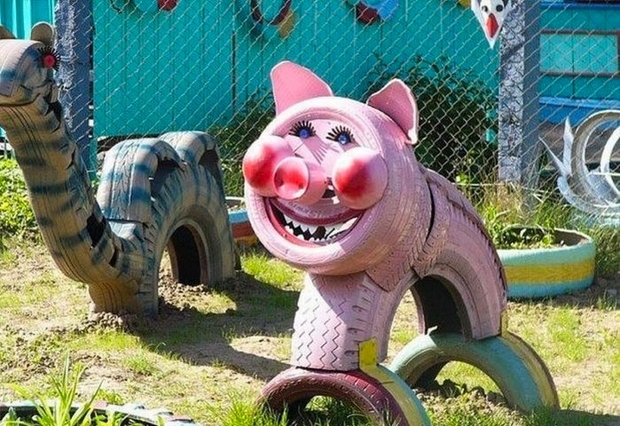 recycled rubber tires painted pig diy kid playground hog tire smile face cute upcycling tires idea
