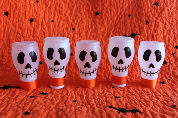 halloween skulls decoration party ideas empty milk bottles
