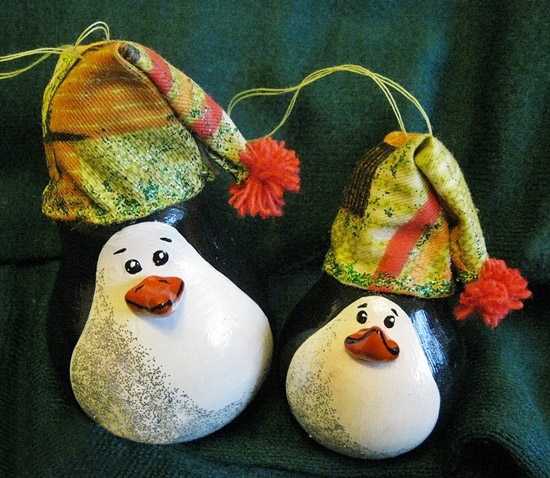 cute penguins with hats made of old bulbs homemade christmas ornaments