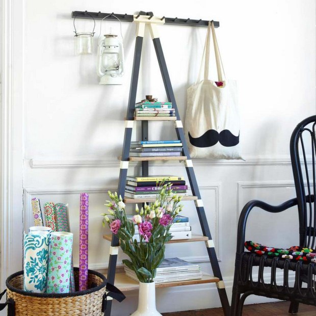diy upcycled ladder bookshelves with hanging lanterns wall decorating idea