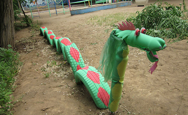 upcycling ideas garden art dragon old tires