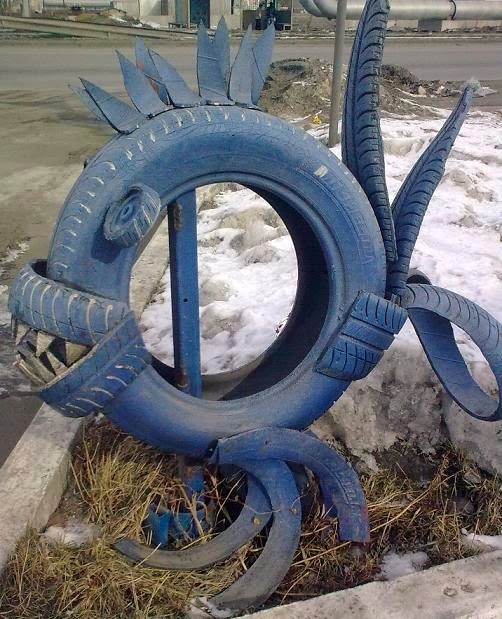 Tire recycling ideas creative old tire recycling blue predatory fish garden idea diy repurposing cut tires