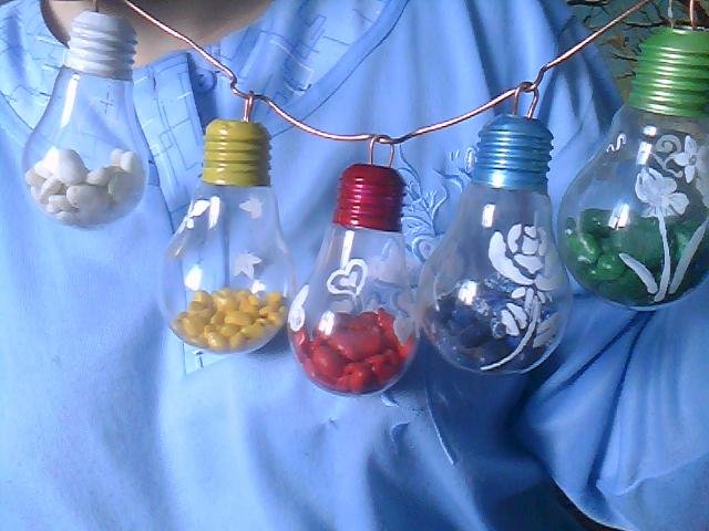diy idea for christmas decoration made of old burned out bulbs ornaments handmade coloured