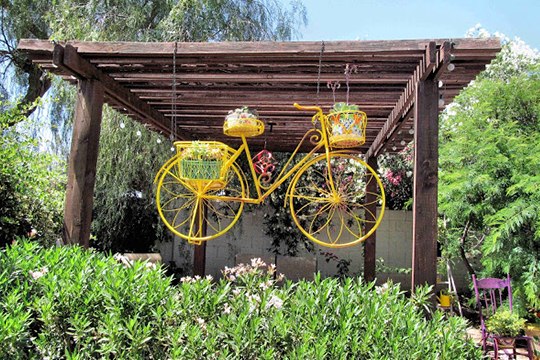 upcycling bikes creative diy flower planter from old yellow bicycle