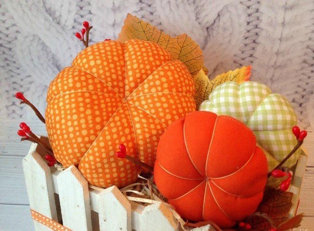 stuffed fabric pumpkin orange hues strings decorations