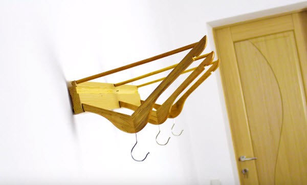 reuse clothes hangers white wall amazing recycled idea